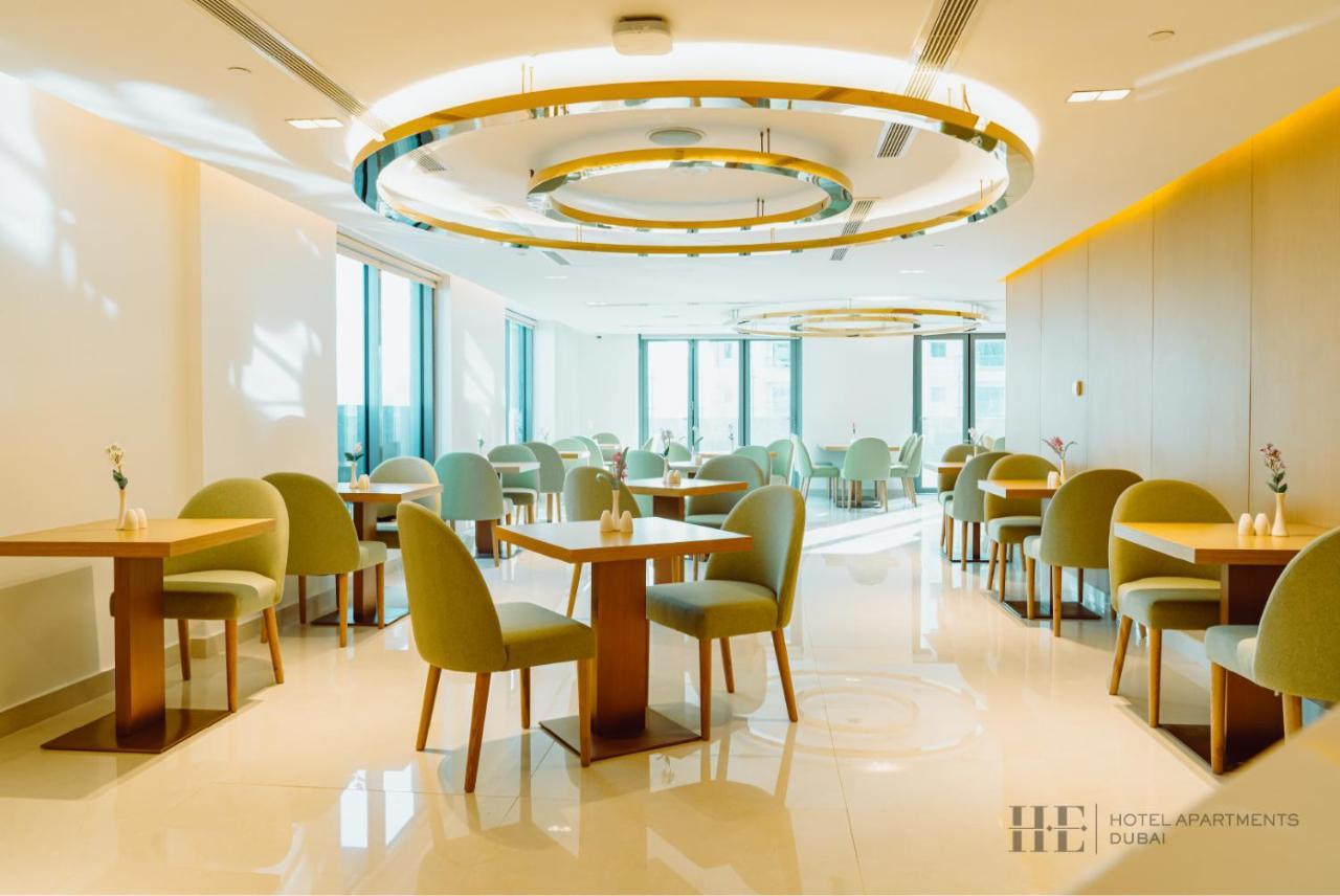 He Hotel Apartments ดูไบ ภายนอก รูปภาพ The restaurant